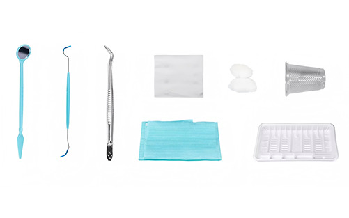 Disposable dental examination kit with mouth mirror, probe and tweezers